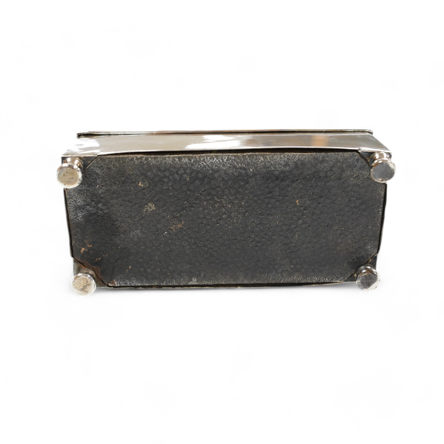 A George V engine turned silver cigarette box, by Padgett & Braham Ltd, London, 1935, 21.6cm and an earlier Irish silver cigarette box. Condition - poor to fair